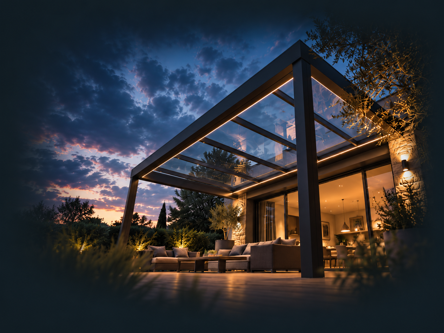 Pergola aluminium vitrée éclairée au crépuscule